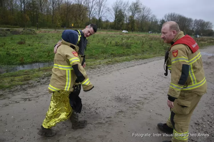 Persoon vast in drijfzand Heerhugowaard